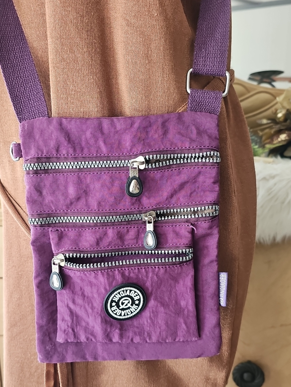 Purple Crossbody Travel Bag with Multiple Zippers